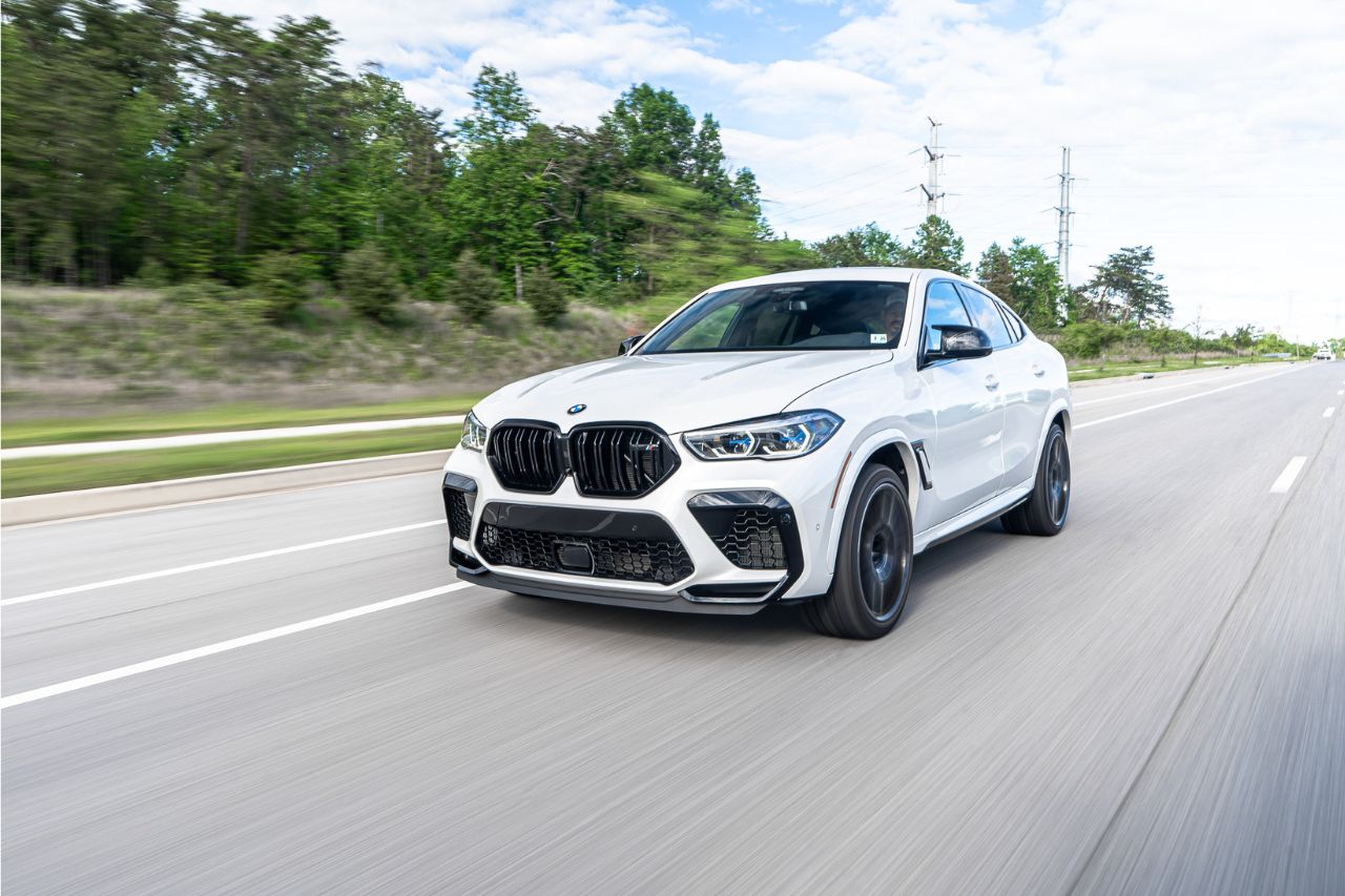 Car cruising on highway - Used Cars Near Hoboken concept image